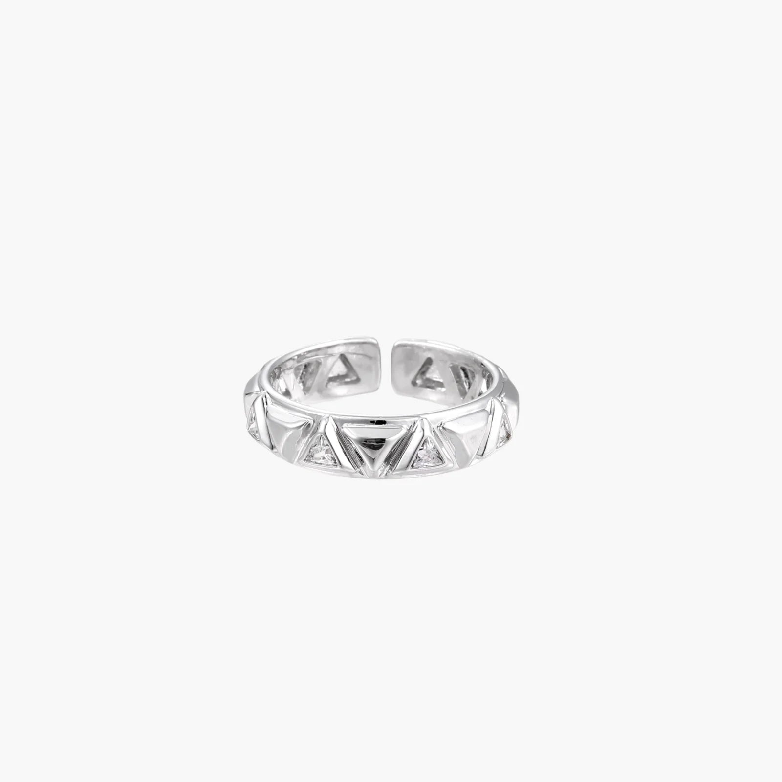 White gold adjustable ring with geometric triangle cutouts and zirconia stones on cream background