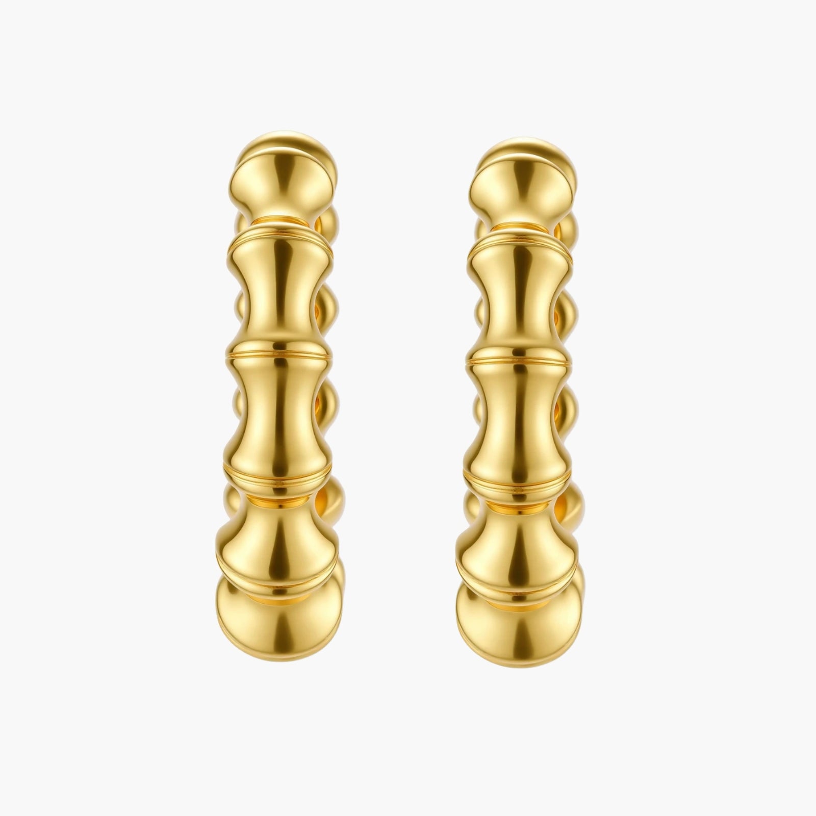 Close-up of gold-plated sterling silver hoop earrings with bamboo-inspired segmented design on white background.