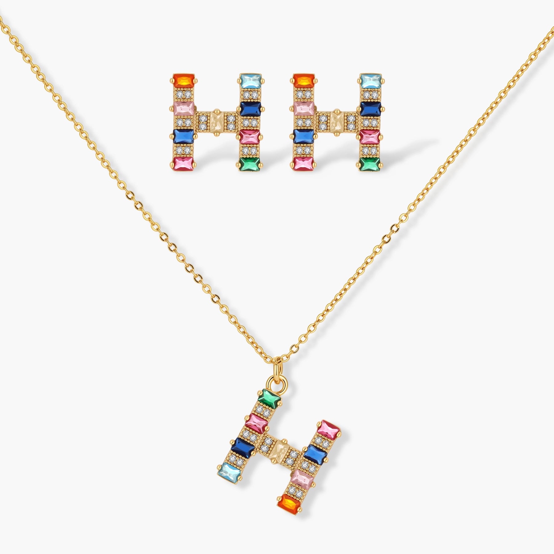 Letter H jewelry set featuring geometric crystal design in gold and white gold plated finish with adjustable chain necklace
