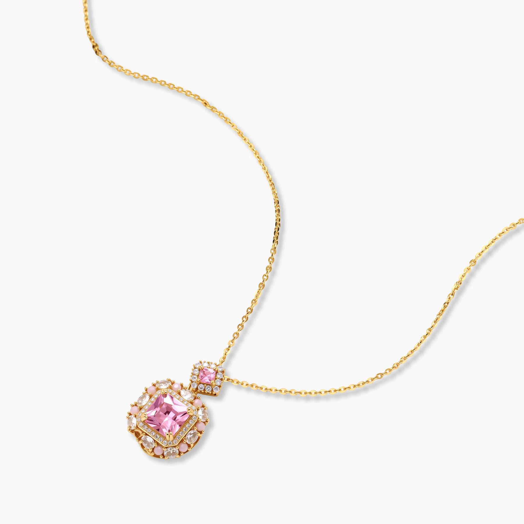 14K gold-plated jewelry set featuring square-cut cubic zirconia stones in ornate layered settings on white background.