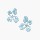 Turquoise enamel flower stud earrings with marbled finish and crystal centers on 18K gold plated brass