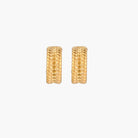 Chunky gold hoops with dimensional ridged texture and 14K plated finish shown in front and side view on cream background.