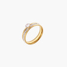 Gold-plated double-band ring with center rhinestone solitaire and channel-set stones on white background
