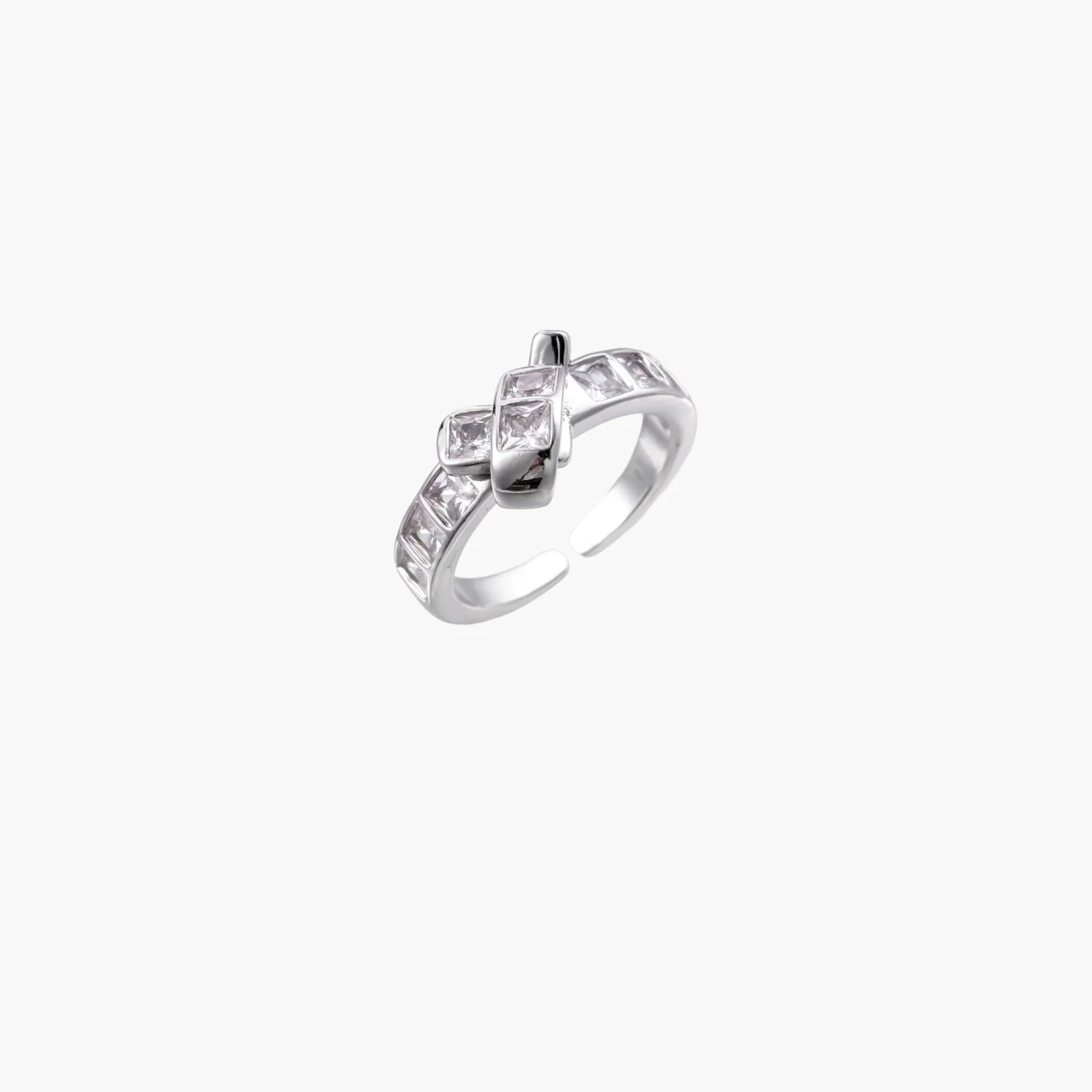 White gold plated adjustable ring featuring offset square cubic zirconia stones in an architectural stacked design
