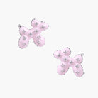 Glossy pink enamel balloon dog stud earrings with crystal details on white gold plated brass, museum-inspired design