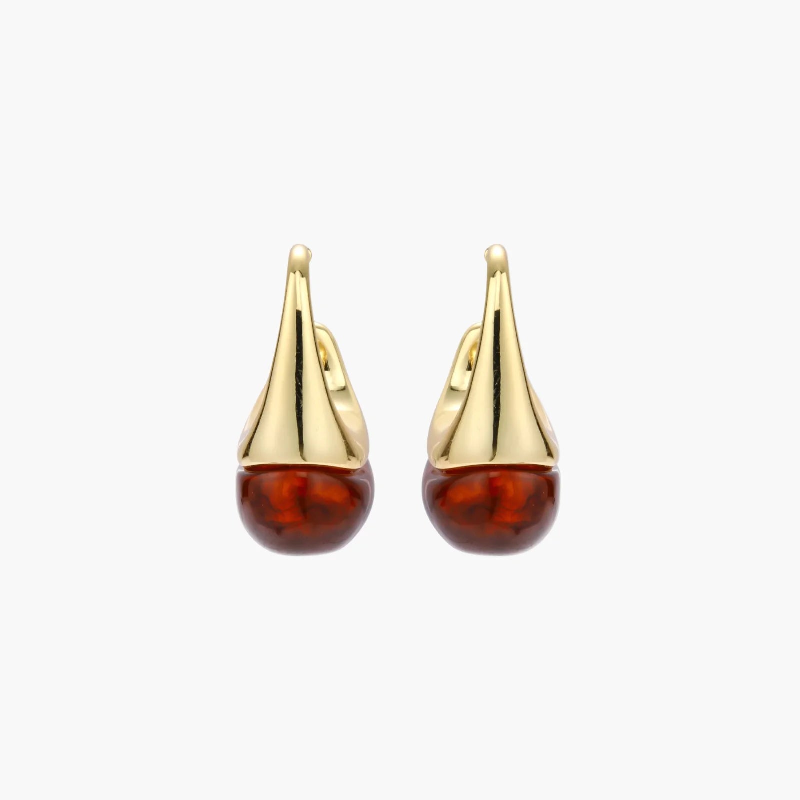 Modern drop earrings with curved gold-plated copper tops and amber resin bottoms creating an organic teardrop silhouette.