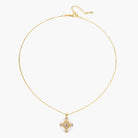 Gold-plated necklace with circular white enamel pendant featuring central zirconia stone and ornate decorative details