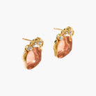 Gold-plated baroque stud earrings with coral-pink liuli stones and cubic zirconia crystals on white background.