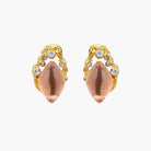 Gold-plated baroque stud earrings with coral-pink liuli stones and cubic zirconia crystals on white background.