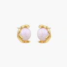 Gold vermeil studs with lustrous pink freshwater pearls in organic crescent settings